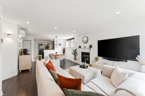 Salon - 589 Rue De Pompadour, Mascouche, QC - Indoor Photo Showing Living Room With Fireplace