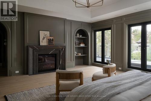 92 Arjay Crescent, Toronto, ON - Indoor Photo Showing Bedroom With Fireplace