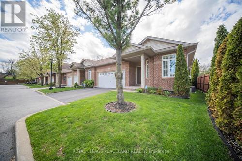 11 - 5595 Drummond Road, Niagara Falls, ON - Outdoor With Facade