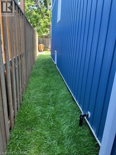 vertical panel siding - 85 Albany Avenue, Hamilton, ON 