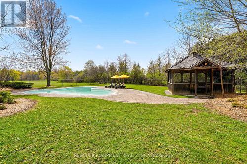 7196 Mcniven Road, Milton, ON - Outdoor With In Ground Pool With Deck Patio Veranda