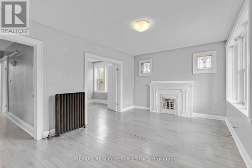 8 - 5 Fairholt Road N, Hamilton, ON - Indoor With Fireplace