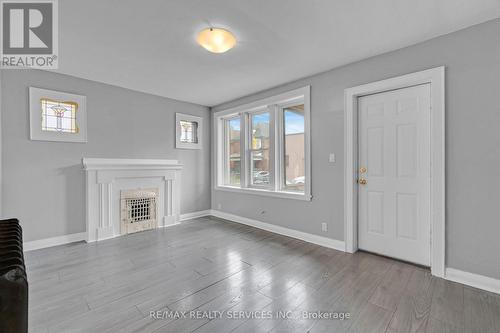 8 - 5 Fairholt Road N, Hamilton, ON - Indoor With Fireplace