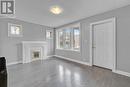 8 - 5 Fairholt Road N, Hamilton, ON  - Indoor With Fireplace 