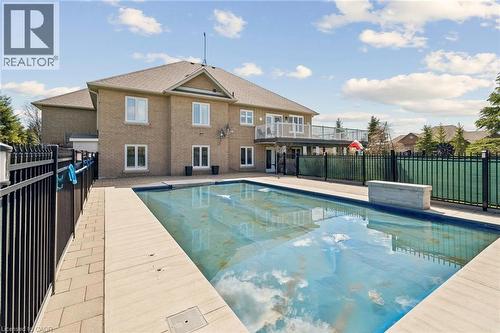 Outdoor swimming pool bordered by light-toned coping and a paved surround - 10 Brolley Crescent, Thornton, ON - Outdoor With In Ground Pool With Deck Patio Veranda