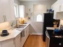 393 Tweed Avenue, Winnipeg, MB  - Indoor Photo Showing Kitchen With Double Sink 