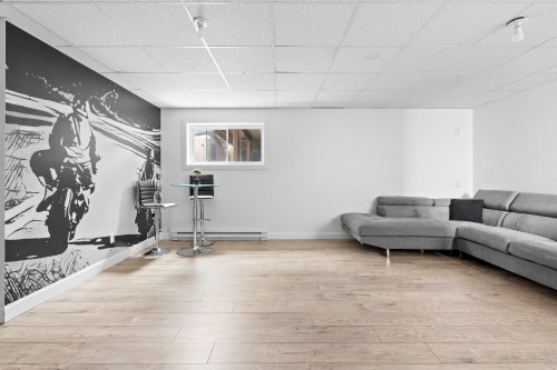 Salle familiale - 138 Rue De Calais, Shannon, QC - Indoor Photo Showing Gym Room