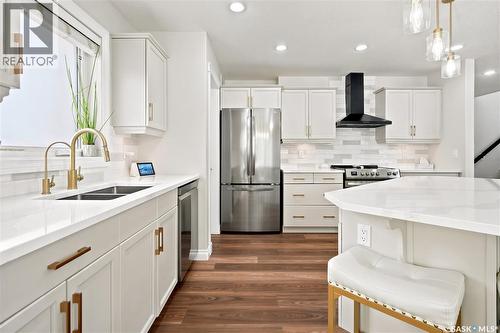 8607 Wascana Gardens Lane, Regina, SK - Indoor Photo Showing Kitchen With Stainless Steel Kitchen With Double Sink With Upgraded Kitchen