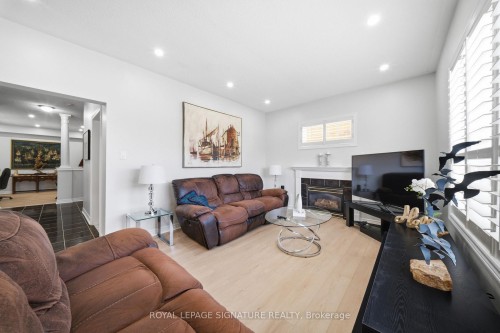 79 Twin Willow Crescent E, Brampton, ON - Indoor Photo Showing Living Room With Fireplace