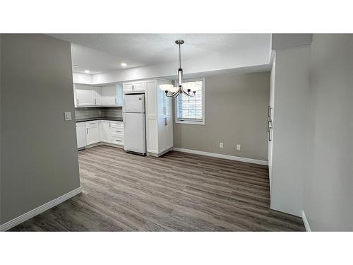 M-212-1520 Venetian Boulevard, Point Edward, ON - Indoor Photo Showing Other Room
