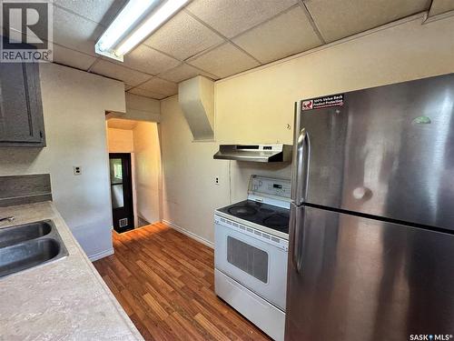 303 4Th Avenue W, Biggar, SK - Indoor Photo Showing Kitchen With Double Sink