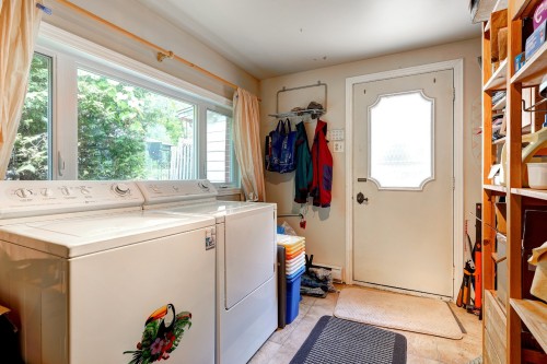 Salle de lavage - 1295 Rue Bourgeois, Laval (Sainte-Dorothée), QC - Indoor Photo Showing Laundry Room