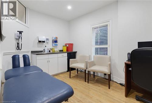 Room #2 -Professionally Equipped/Furnished Office space featuring sink and counter-top, and built-in cabinetry with recessed lighting. - 189 Hughson Street, Hamilton, ON 