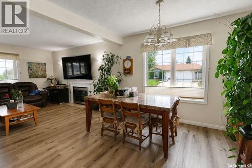3 Meagher Place, Prince Albert, SK - Indoor Photo Showing Dining Room With Fireplace