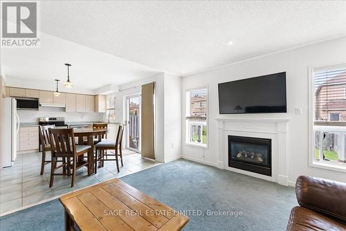 34 Mcsweeney Crescent, Ajax, ON - Indoor Photo Showing Living Room With Fireplace