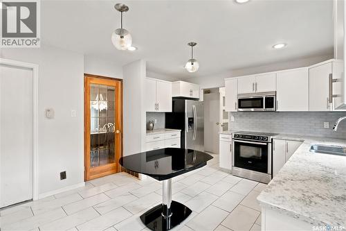 225 Clearwater Court, Saskatoon, SK - Indoor Photo Showing Kitchen With Double Sink