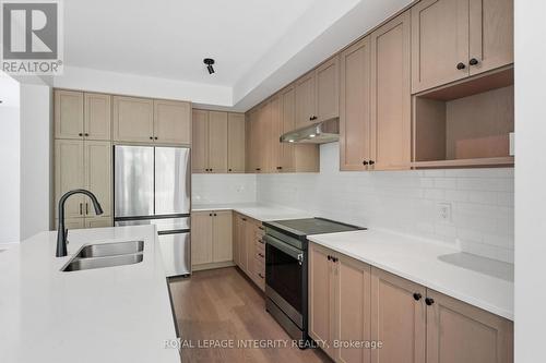 14 Academie Street, Russell, ON - Indoor Photo Showing Kitchen With Double Sink