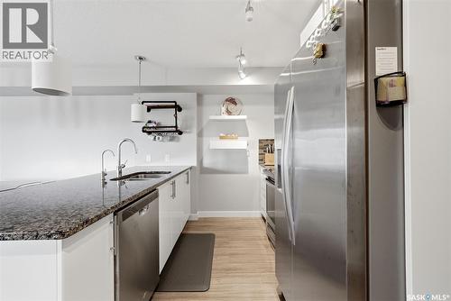 212 5301 Universal Crescent, Regina, SK - Indoor Photo Showing Kitchen With Double Sink With Upgraded Kitchen