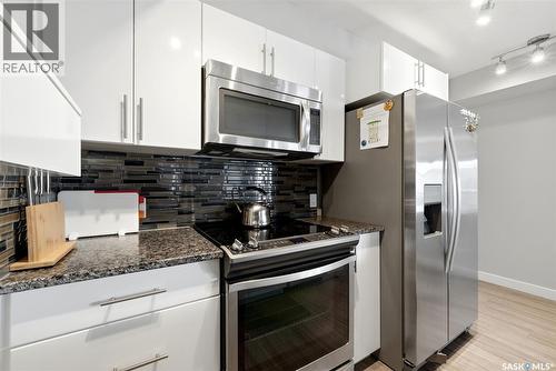 212 5301 Universal Crescent, Regina, SK - Indoor Photo Showing Kitchen With Upgraded Kitchen
