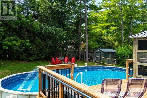 11 Hillside Drive, Selwyn, ON - Outdoor With Above Ground Pool With Backyard