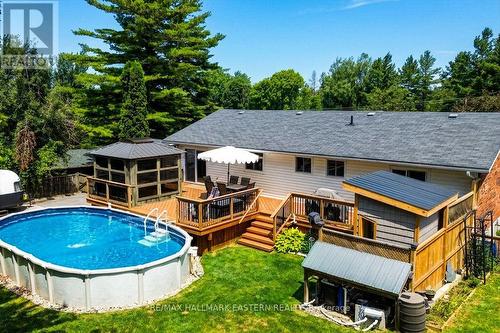 11 Hillside Drive, Selwyn, ON - Outdoor With Above Ground Pool With Deck Patio Veranda