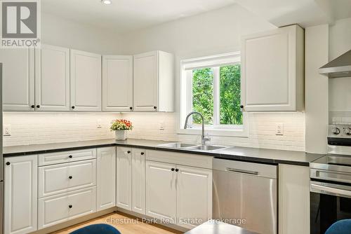 1435 Juddhaven Road, Muskoka Lakes (Medora), ON - Indoor Photo Showing Kitchen With Double Sink