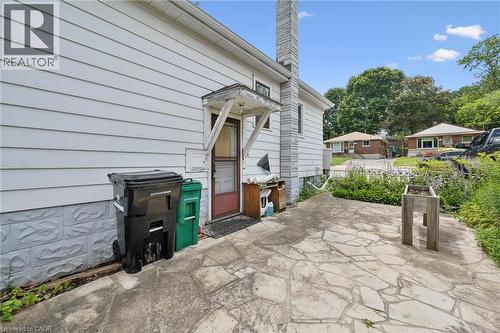 Flagstone patio surface providing exterior access - 95 Forest Road, Cambridge, ON - Outdoor With Exterior