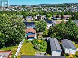 Aerial perspective showcasing the home, backyard, and surrounding neighbourhood. - 