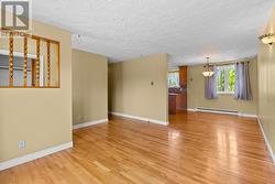 Open living and dining area designed for family gatherings. - 