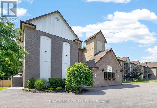 205 - 20 JOHN STREET  Grimsby, ON L3M 1X5