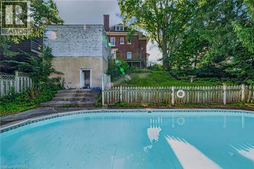 58 Lorne Crescent, Brantford, ON - Outdoor With In Ground Pool