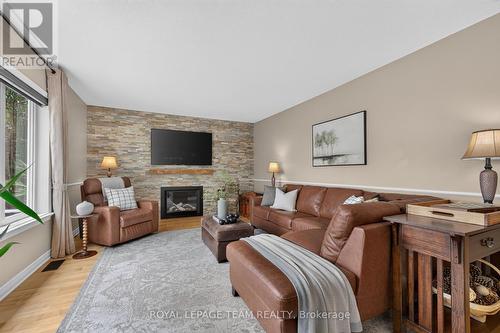 12 Forillon Crescent, Ottawa, ON - Indoor Photo Showing Living Room With Fireplace