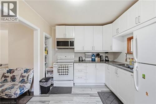 100 Chestnut Avenue, Hamilton, ON - Indoor Photo Showing Kitchen With Double Sink
