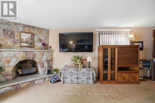 229 East 8Th Street, Hamilton, ON - Indoor Photo Showing Living Room With Fireplace