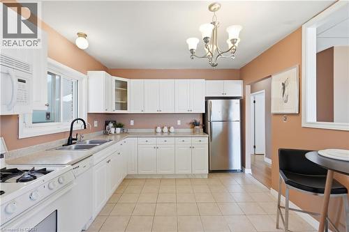 104 Nash Road S, Hamilton, ON - Indoor Photo Showing Kitchen With Double Sink