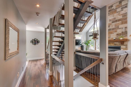 Escalier - 44 Imp. Des Conifères, Cantley, QC - Indoor Photo Showing Other Room With Fireplace