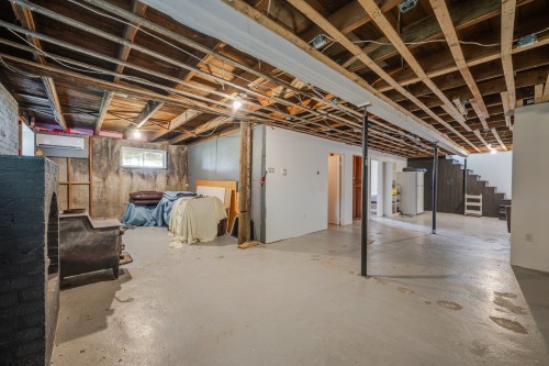 Salle familiale - 6800 Route Marie-Victorin, Contrecoeur, QC - Indoor Photo Showing Basement