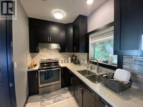 4849 Twedle Avenue, Terrace, BC - Indoor Photo Showing Kitchen With Double Sink