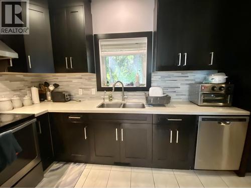 4849 Twedle Avenue, Terrace, BC - Indoor Photo Showing Kitchen With Double Sink