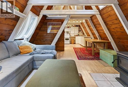 7685 Ships Point Rd, Fanny Bay, BC - Indoor Photo Showing Other Room With Fireplace