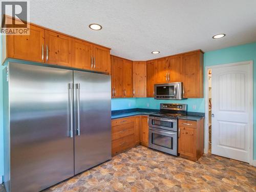 380 Dennis Road, Quesnel, BC - Indoor Photo Showing Kitchen With Stainless Steel Kitchen