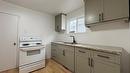 982 Alexander Ave, Winnipeg, MB  - Indoor Photo Showing Kitchen With Double Sink 