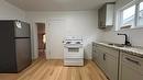 982 Alexander Ave, Winnipeg, MB  - Indoor Photo Showing Kitchen With Double Sink 