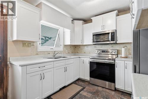 29 Macdowall Crescent, Prince Albert, SK - Indoor Photo Showing Kitchen With Double Sink