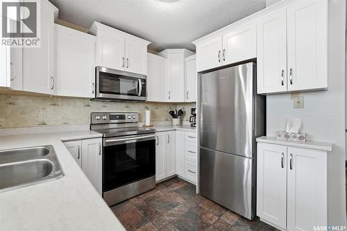 29 Macdowall Crescent, Prince Albert, SK - Indoor Photo Showing Kitchen With Stainless Steel Kitchen With Double Sink
