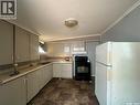 619 L Avenue S, Saskatoon, SK  - Indoor Photo Showing Kitchen With Double Sink 