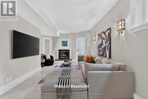 33 Munro Boulevard, Toronto, ON - Indoor Photo Showing Living Room With Fireplace
