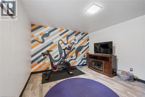 Dedicated fitness space with wood-finish flooring - 223 Carter Avenue, Waterloo, ON - Indoor