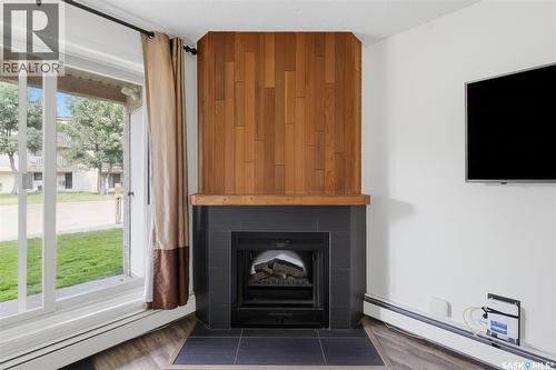 717 310 Stillwater Drive, Saskatoon, SK - Indoor Photo Showing Living Room With Fireplace