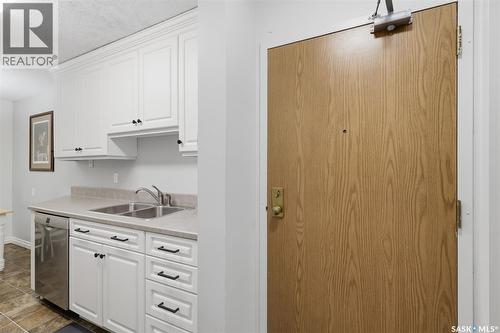 717 310 Stillwater Drive, Saskatoon, SK - Indoor Photo Showing Kitchen With Double Sink